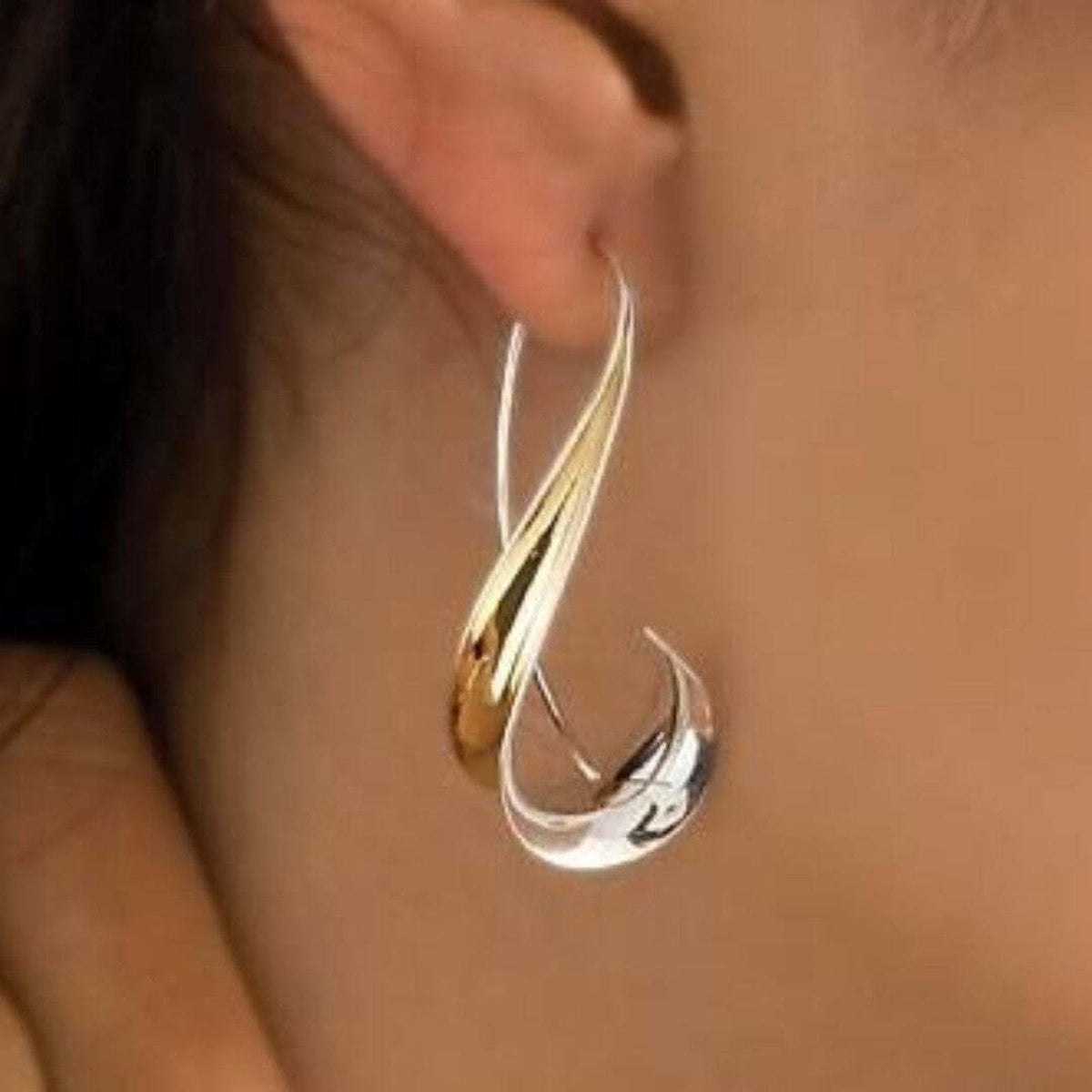 Izsmalcināti mūžīga dizaina zelta auskari