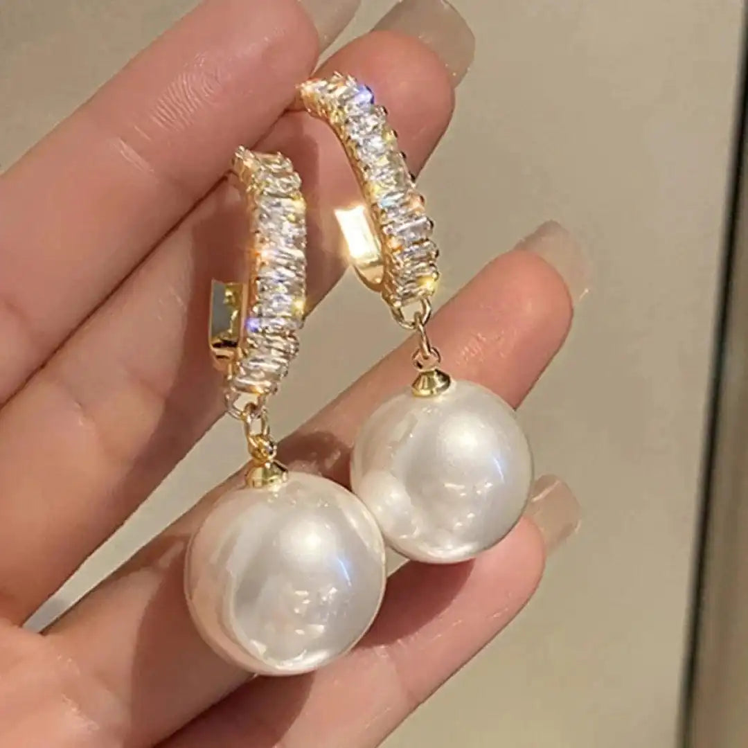 Eleganti auskari ar pērlēm un cirkoniju