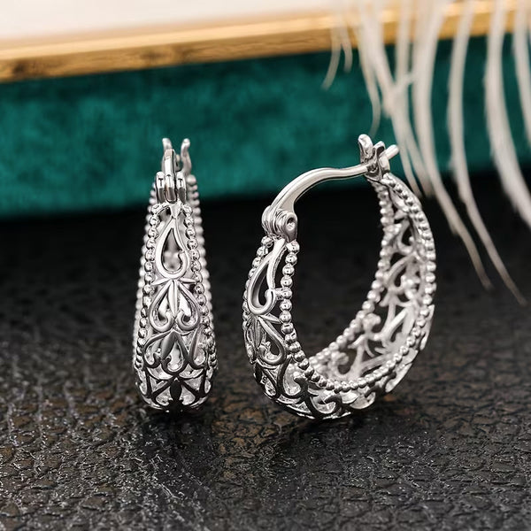 Greznie filigrānie riņķa auskari