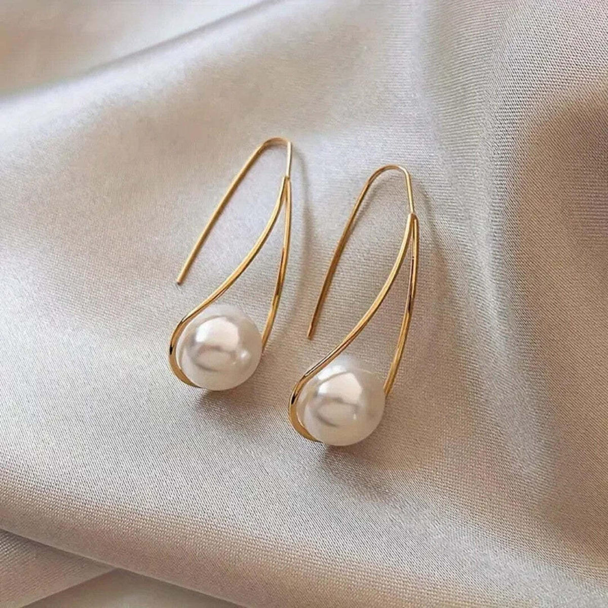 Eleganti pērļu auskari