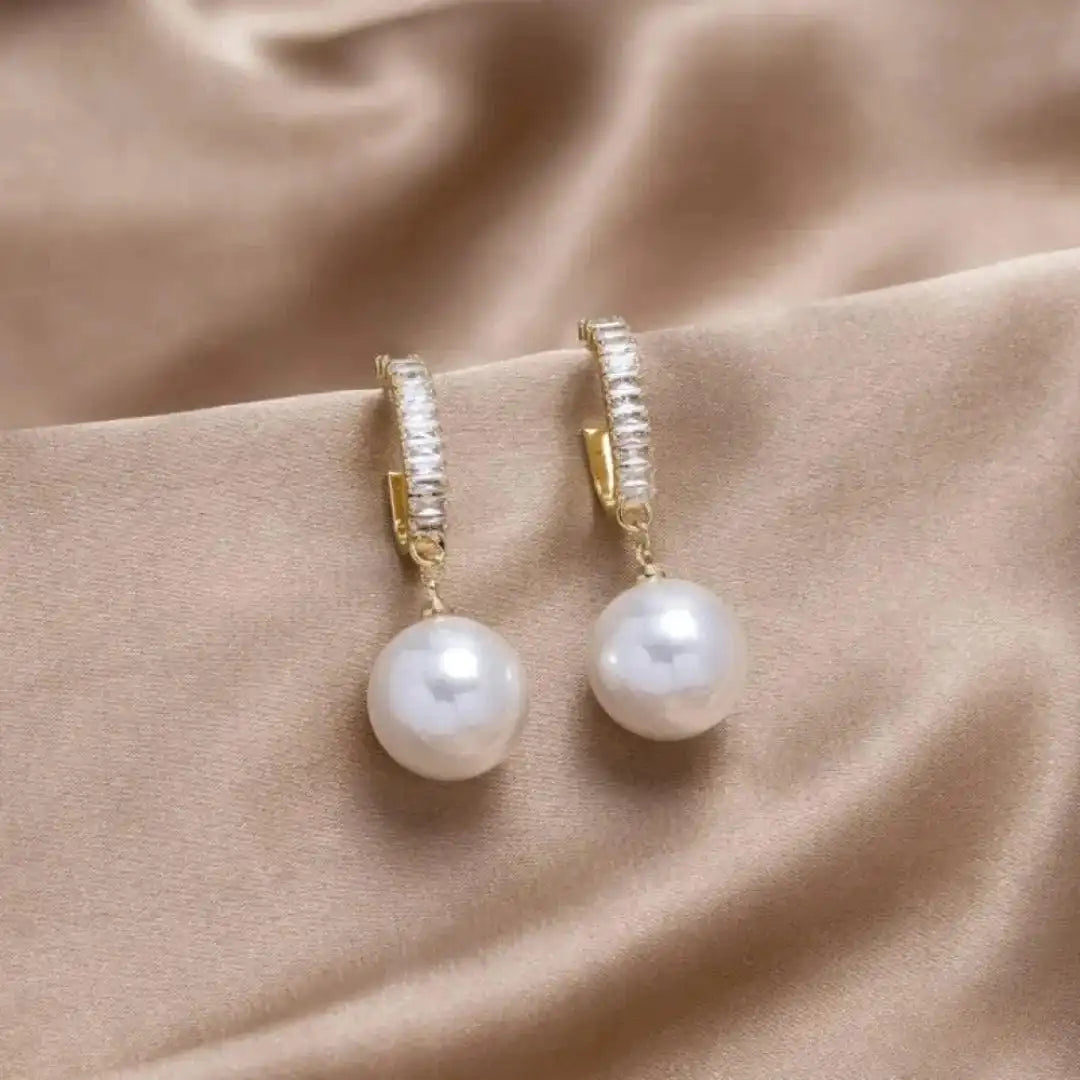 Eleganti auskari ar pērlēm un cirkoniju