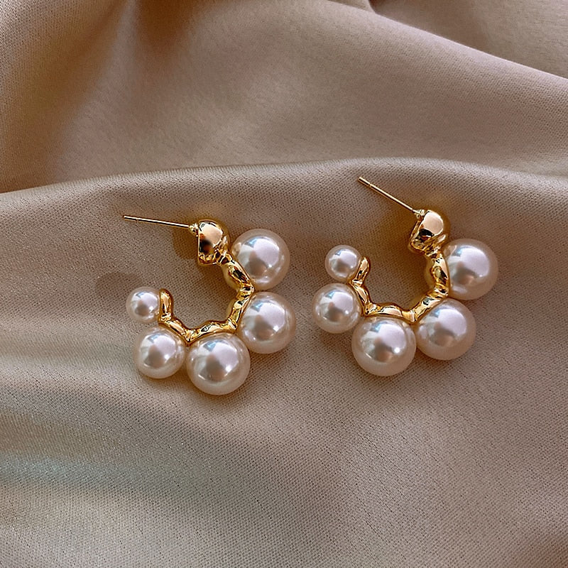 Eleganti minimālistiski pērļu auskari