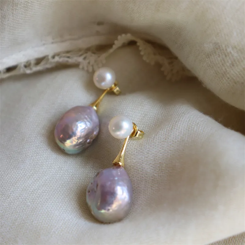 Eleganti violetu pērļu auskari